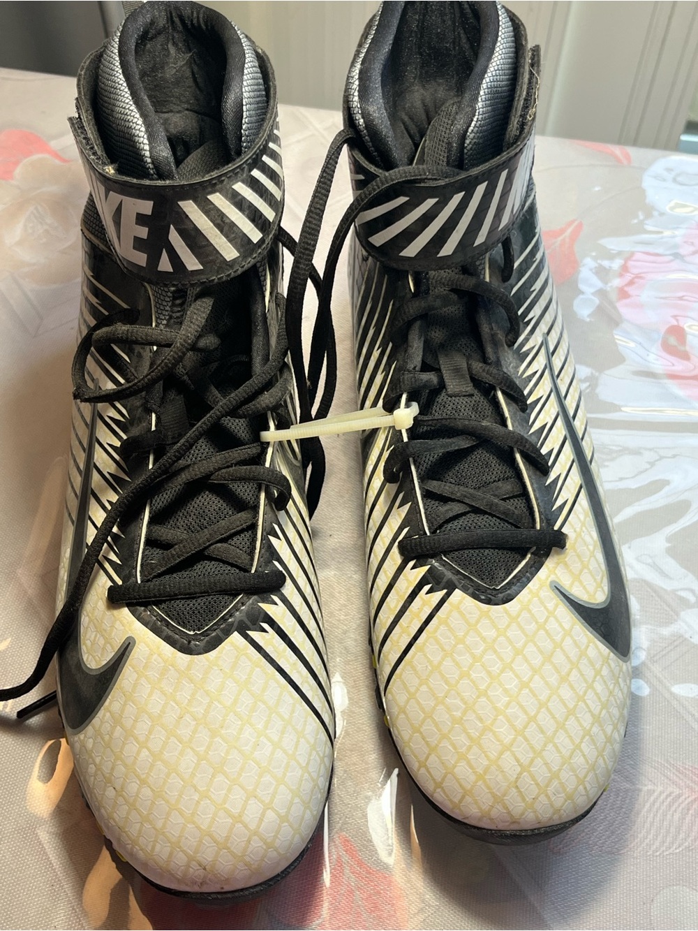 Nike Men Black and White High-Top football Cleats with Yellow Accents